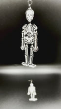 Load and play video in Gallery viewer, Spooky Skeleton Dangle Earrings | Halloween | Acrylic Skeleton Earrings
